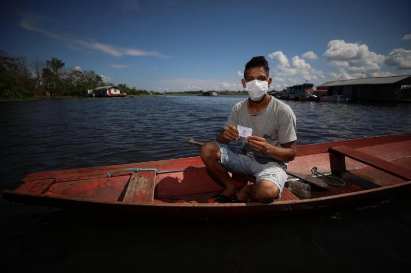 Drive-thru fluvial favorece população ribeirinha de Iranduba durante campanha Vacina Amazonas